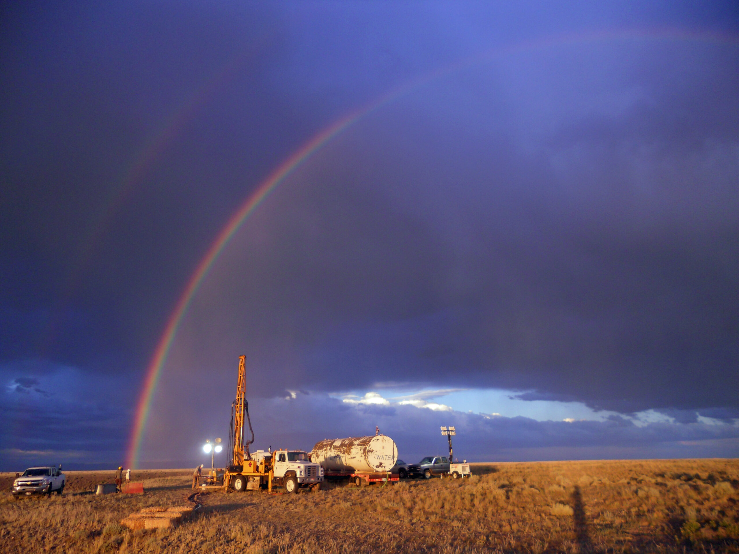 A rainbow appears over National Science Foundation-funded drilling site in Wyoming’s Bighorn   Basin. In a study led by University of Utah geochemist Gabe Bowen, sediment cores drilled at the site   revealed a global warming episode almost 56 million years ago resembled today’s in terms of the size   and duration of carbon releases to the atmosphere. Image credit: Elisabeth Denis, Pennsylvania State University