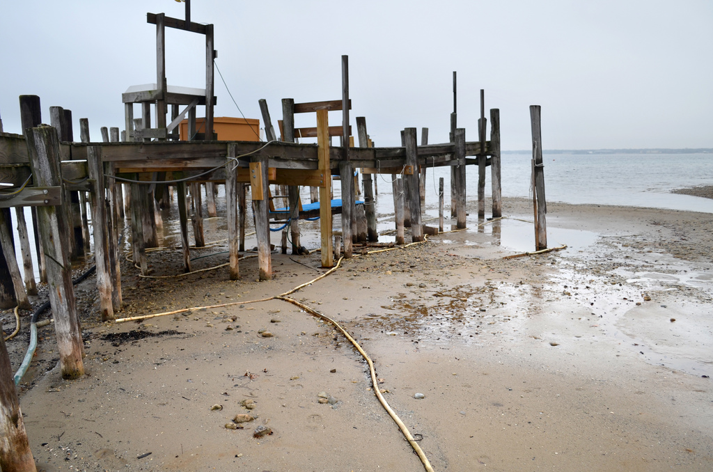 Dock showing low water levels in Grand Traverse Bay in Michigan. Image credit: Michigan Sea Grant