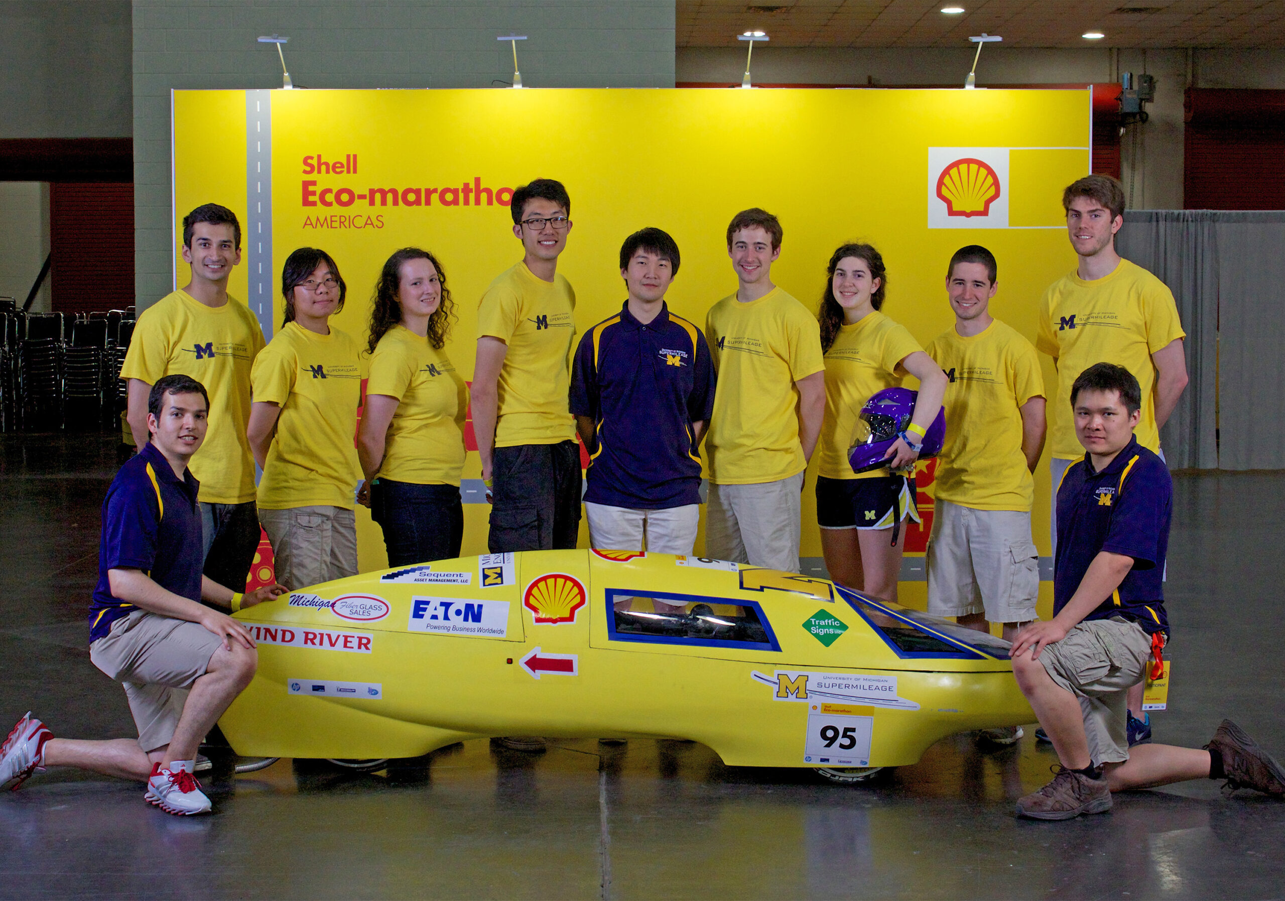Taken at the 2014 Shell Eco­Marathon, the U­M Supermilage team poses with  their vehicle. Image courtesy: University of Michigan Supermileage Team