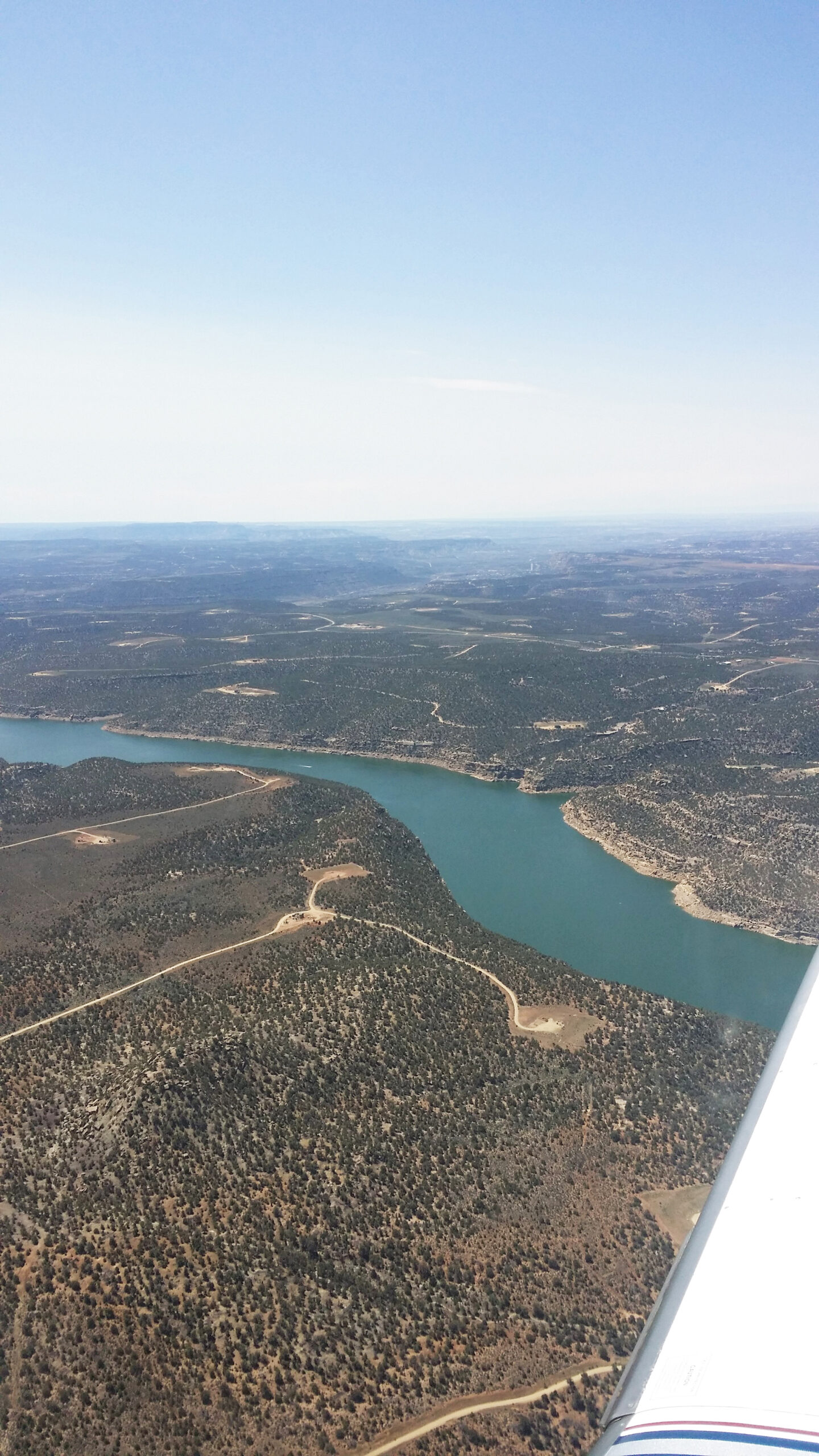 A view over the wing of the Twin Otter aircraft Michigan Engineering researchers rode in to measure atmospheric methane concentrations over the Four Corners region. Image credit: Sonja Wolter