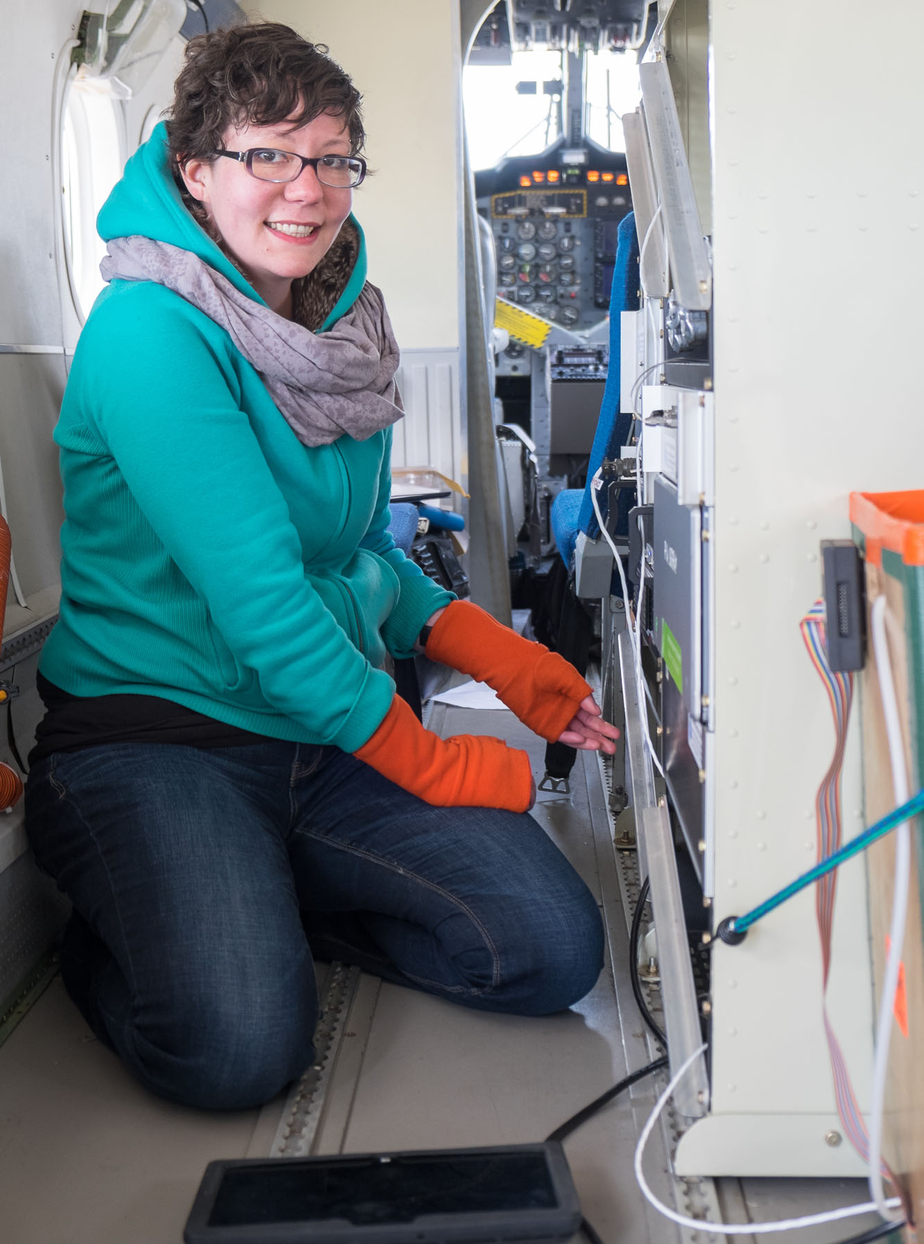 Mackenzie Smith, a postdoctoral research, prepares the instruments for take-off on a flight to measure methane concentrations over the Four Corners region. Image credit: Will von Dauster, NOAA