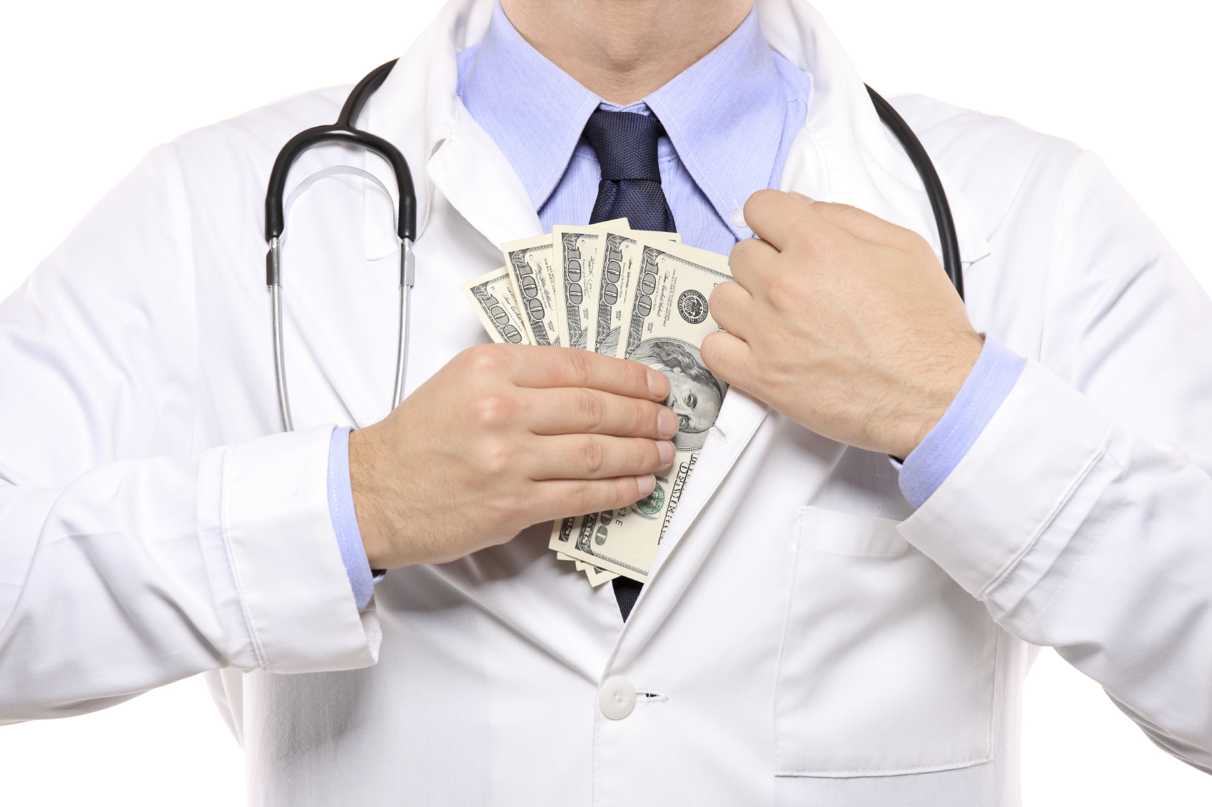 A doctor puts money in his pocket. (stock image)