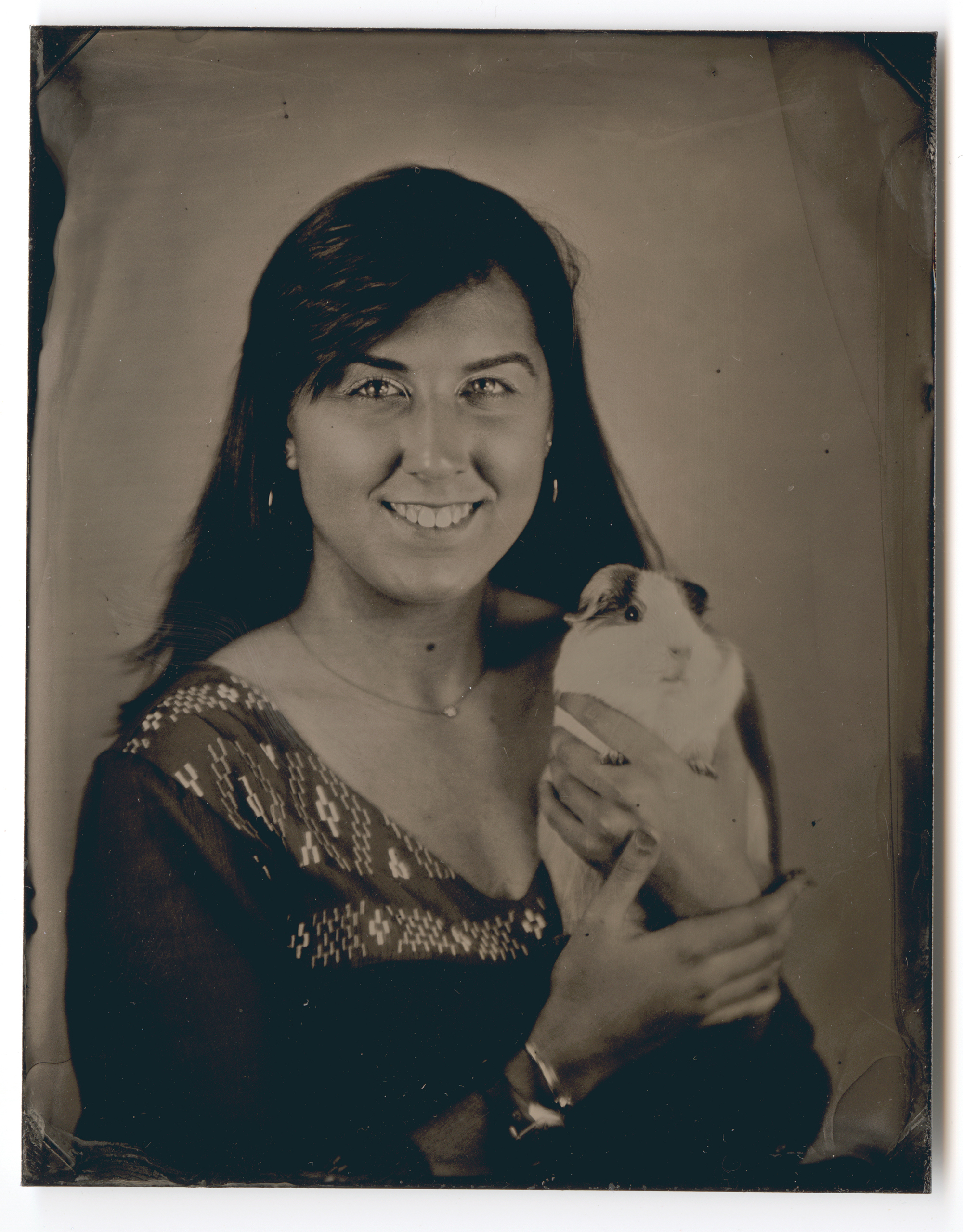 Emily Moore, 2015 Graduate, U-M Stamps School of Art & Design ​poses for her tintype photograph, taken by Shimmin and Whalen Travelling Tintypists