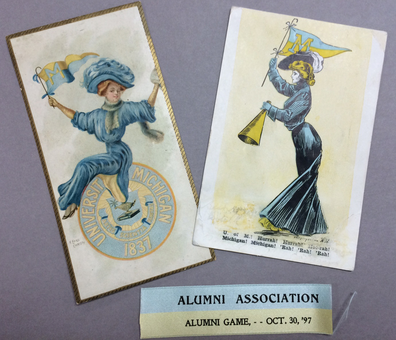 Postcards and a ticket to an 1897 football game show how the shades of maize and blue have evolved over time.