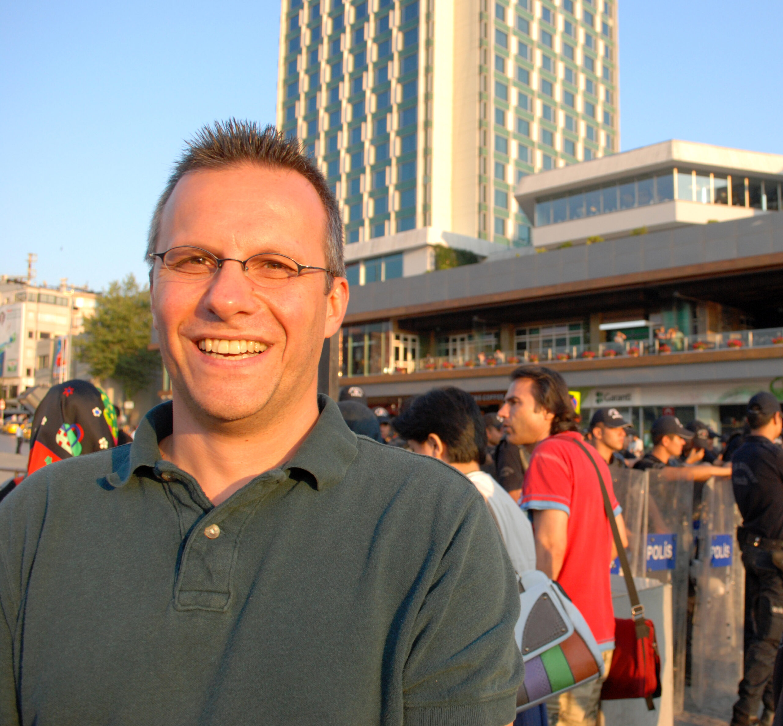 Erdem Cipa stands near a police line in Instabul's Taksim Square during the Gezi Park anti-government protests in 2013. Image courtesy: Erdem Cipa