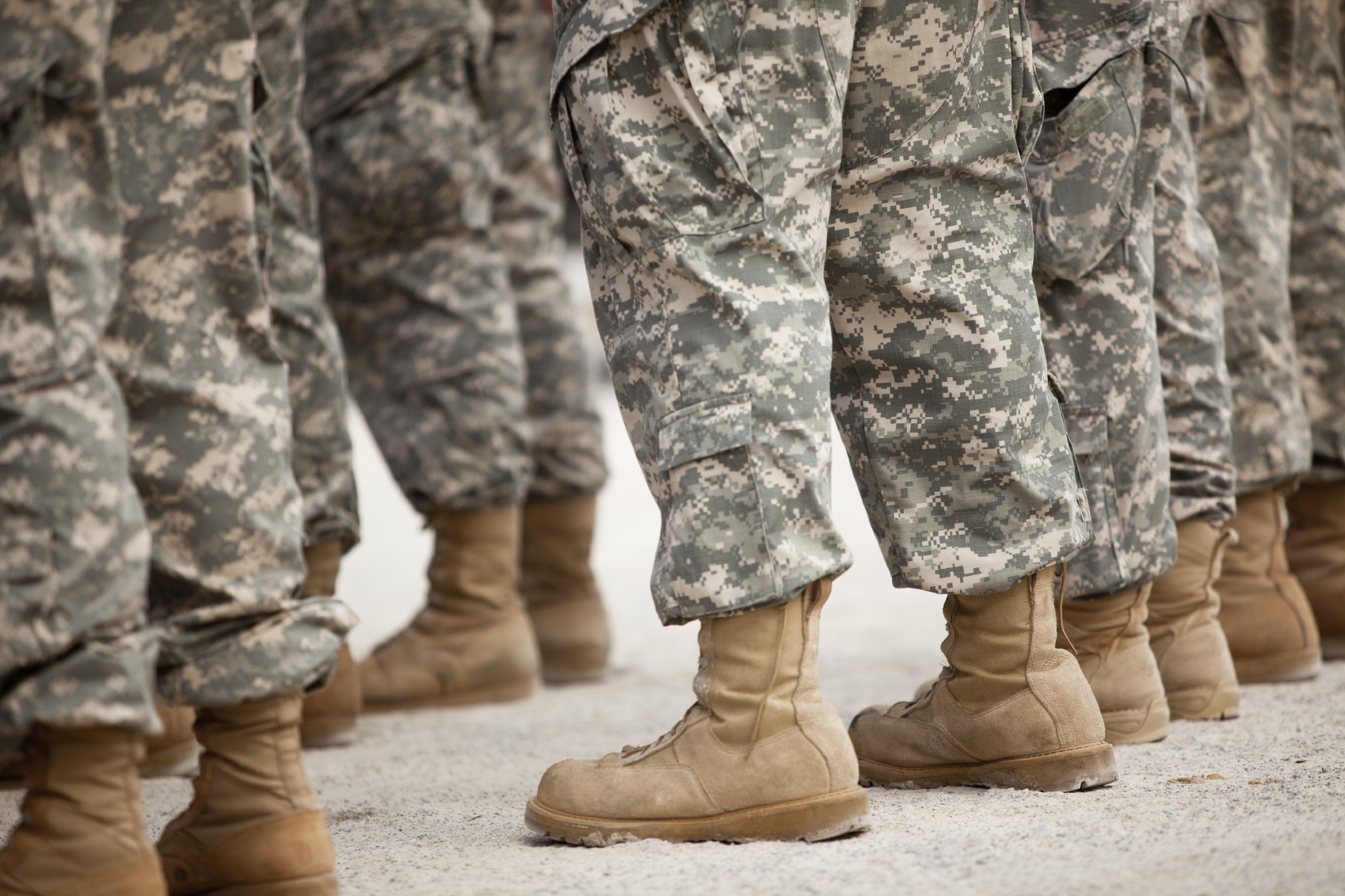 Soldiers' boots on the ground. (stock image)