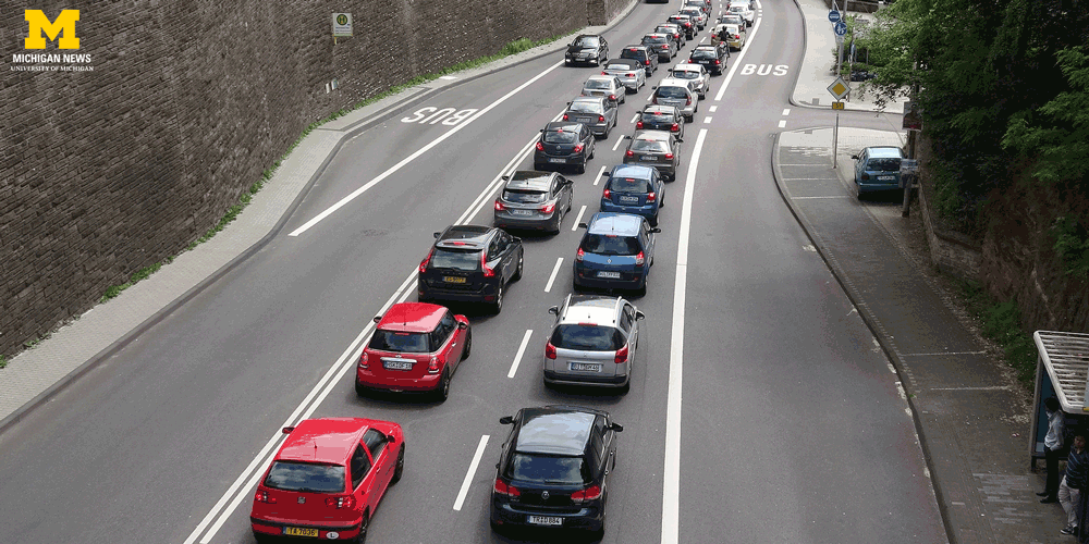 An animation of cars disappearing on the road. 