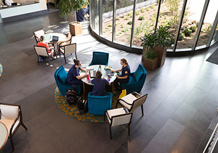 UMSN students in the front lobby of the new building.