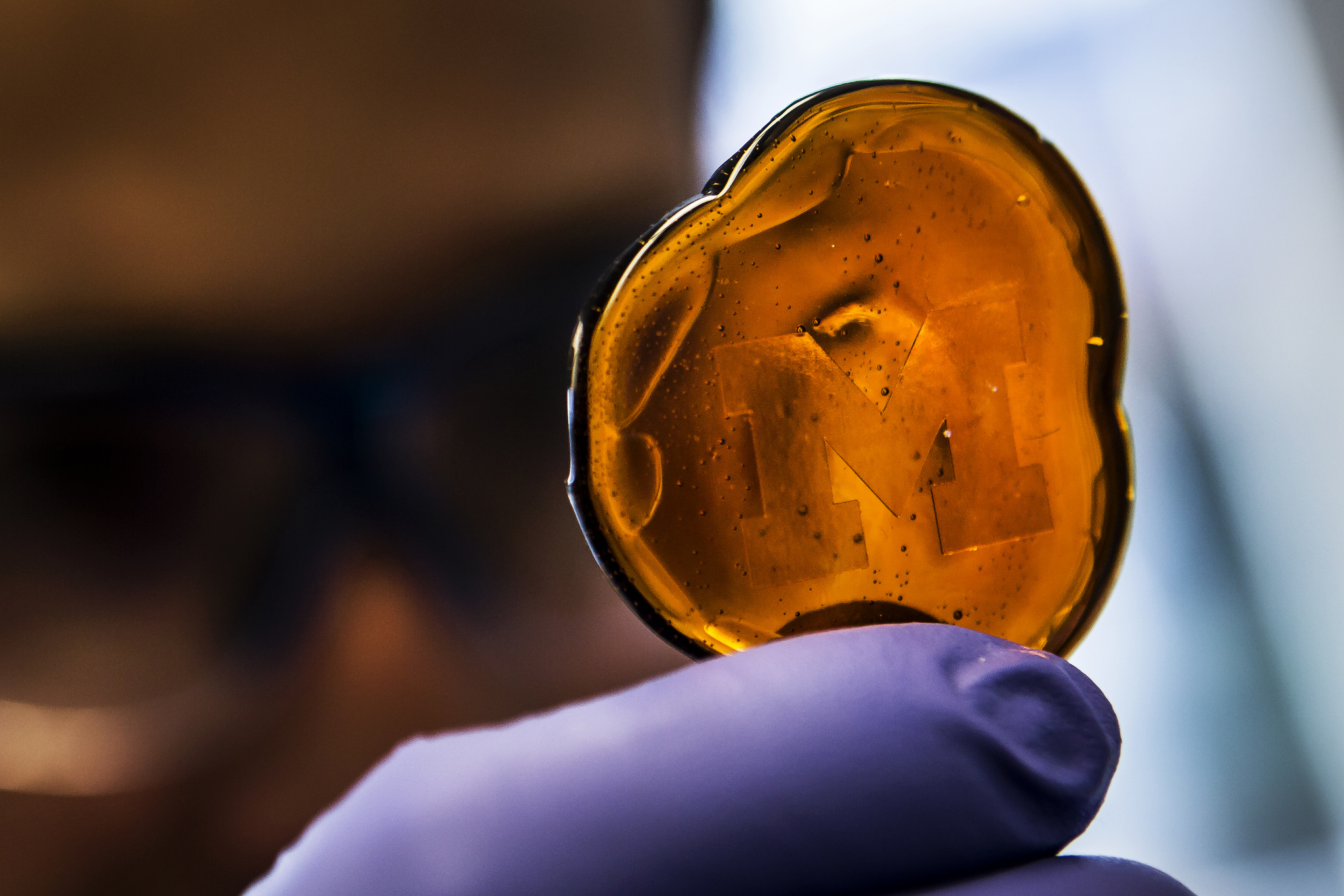 Labuz is part of BME Professor Shu Takayama's research team that studies the behavior of soft cells like those in lungs and livers. To do that, Takayama's group requires soft silicone structures that are less than a millimeter wide and subsequently difficult to construct without breakage. The candy molds that were created enables for the creation of these pillars. Image credit: Joseph Xu, Michigan Engineering