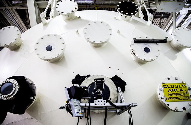 The chamber that holds an X3 thruster that AERO Professor Alec Gallimore's team has been working on in conjunction with NASA in the Plasmadynamics & Electric Propulsion Laboratory in Ann Arbor, MI on April 28, 2015. The research team added the eyeballs as a fun decoration, but have yet to name the chamber. Image credit: Joseph Xu, Michigan Engineering Communications & Marketing