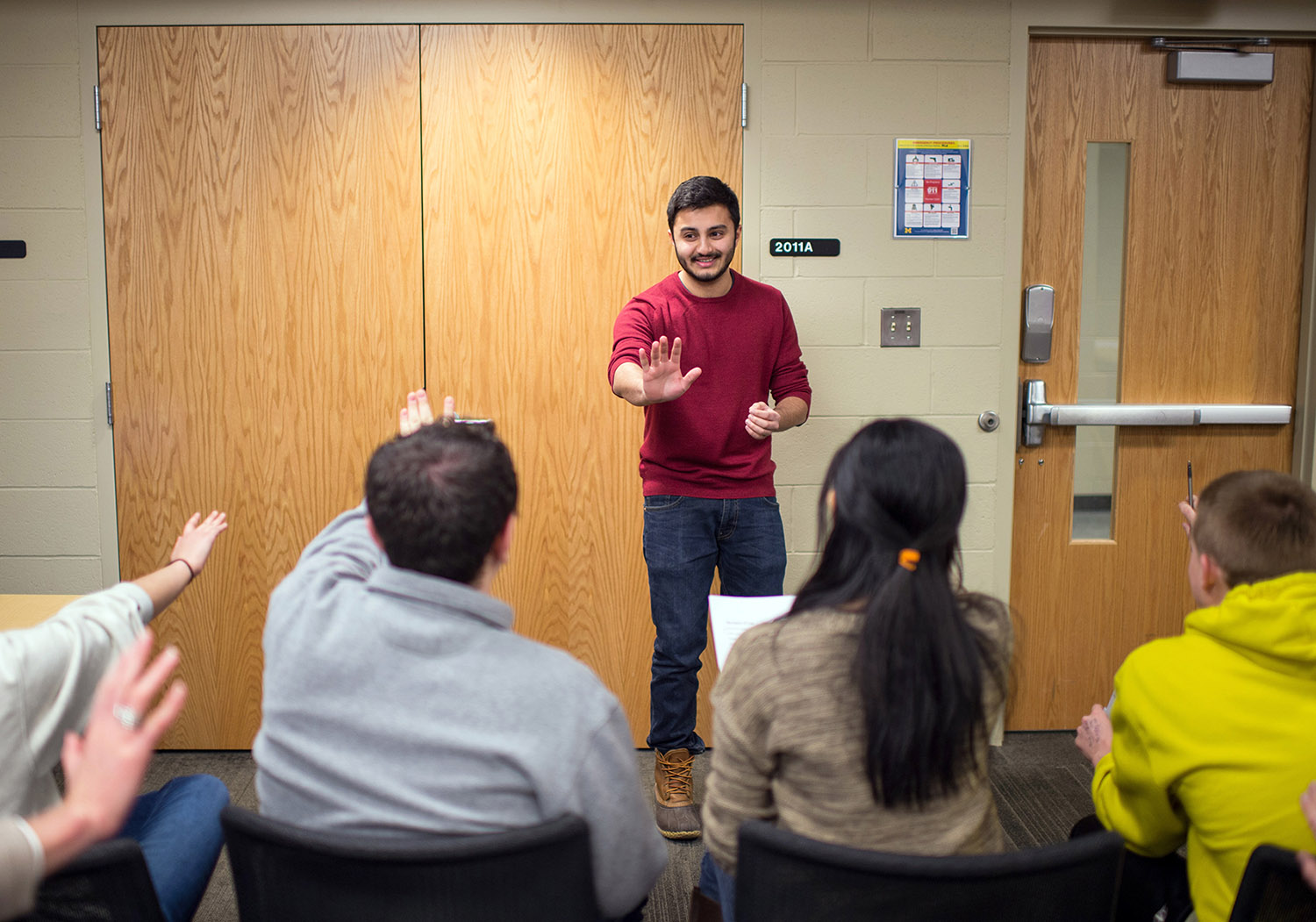 Amar Ambani practices his talk in front of the class.