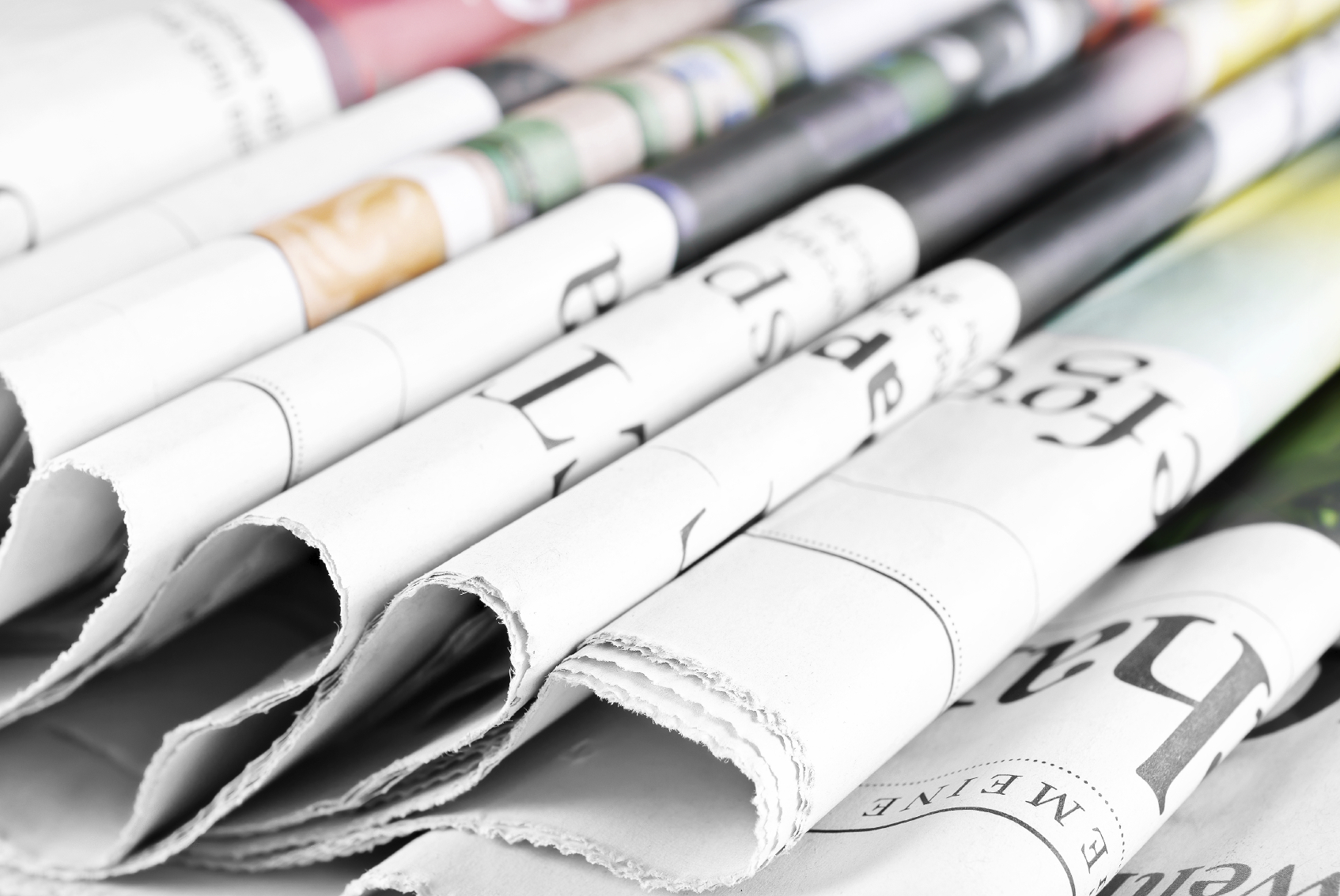 Heap of newspapers. (stock image)