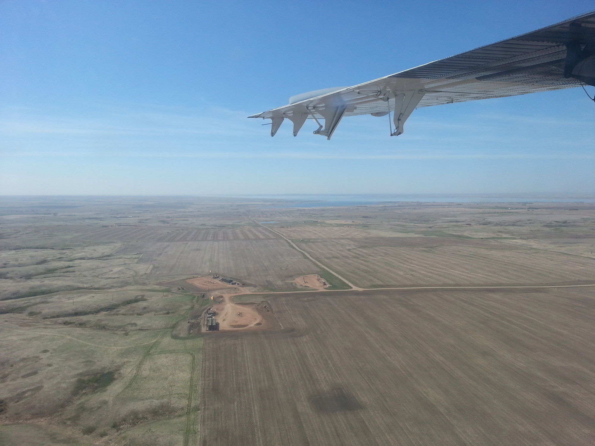 Researchers flew over the Bakken oil field in North Dakota and Montana to gather data about emissions of ethane, a hydrocarbon gas that can damage air quality and impact climate. This is the view from their NOAA Twin Otter aircraft. Credit: Eric Kort