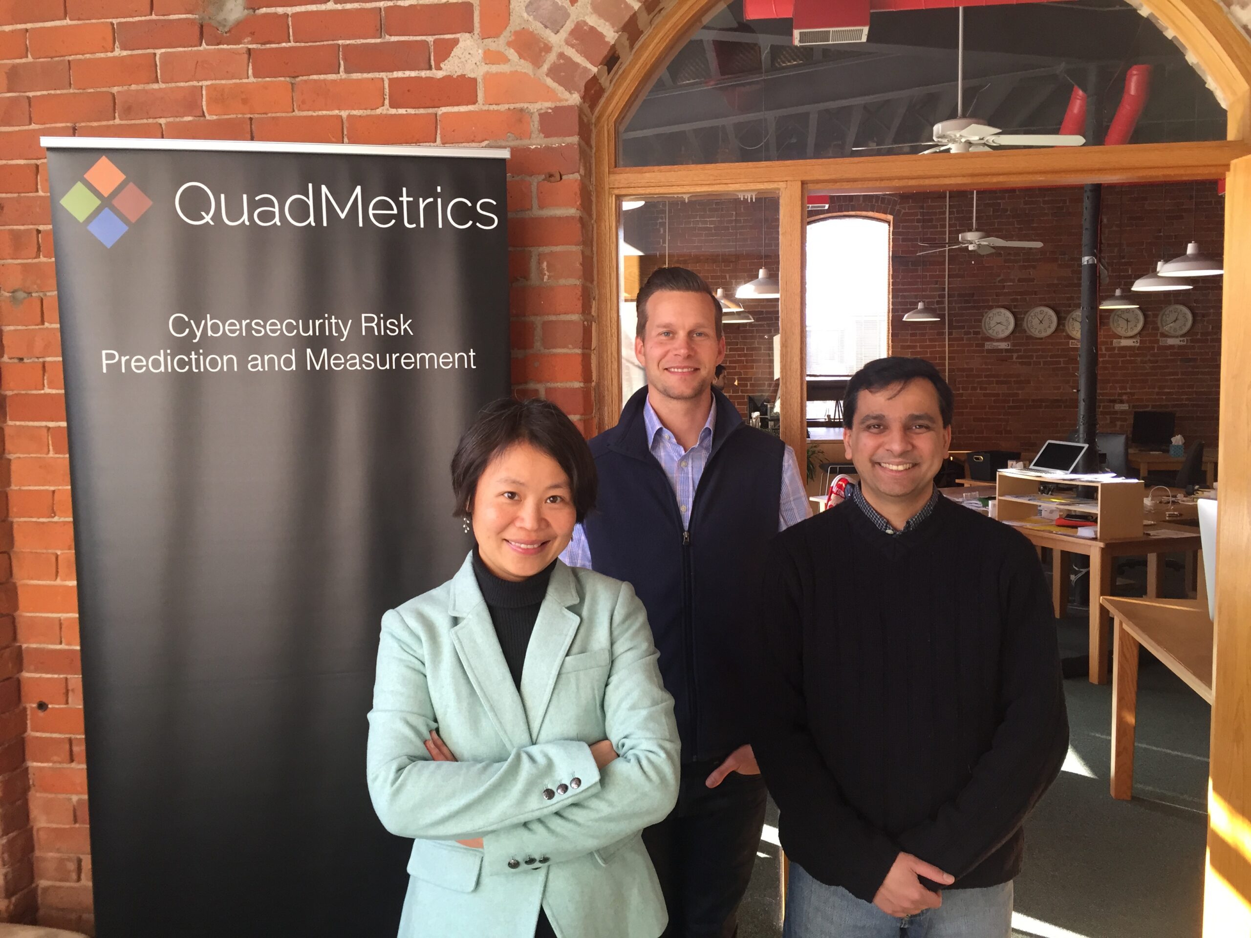 Mingyan Liu, left, is an engineering professor at U-M and chief science officer, and Wes Huffstutter, center, is CEO. At right is Manish Karir, chief technology officer. Images courtesy: QuadMetrics