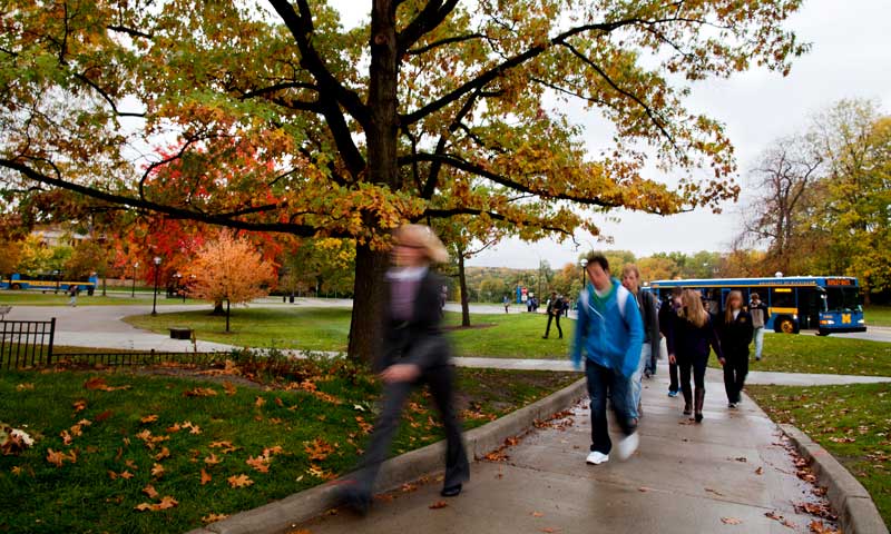 Students get off the bus at Pierpont Commons on U-M’s North Campus. Under the proposed new system, high-traffic areas like this one would see more frequent buses, while less-used areas would be served by on-demand shared vehicles. Image credit: Joseph Xu, Michigan Engineering