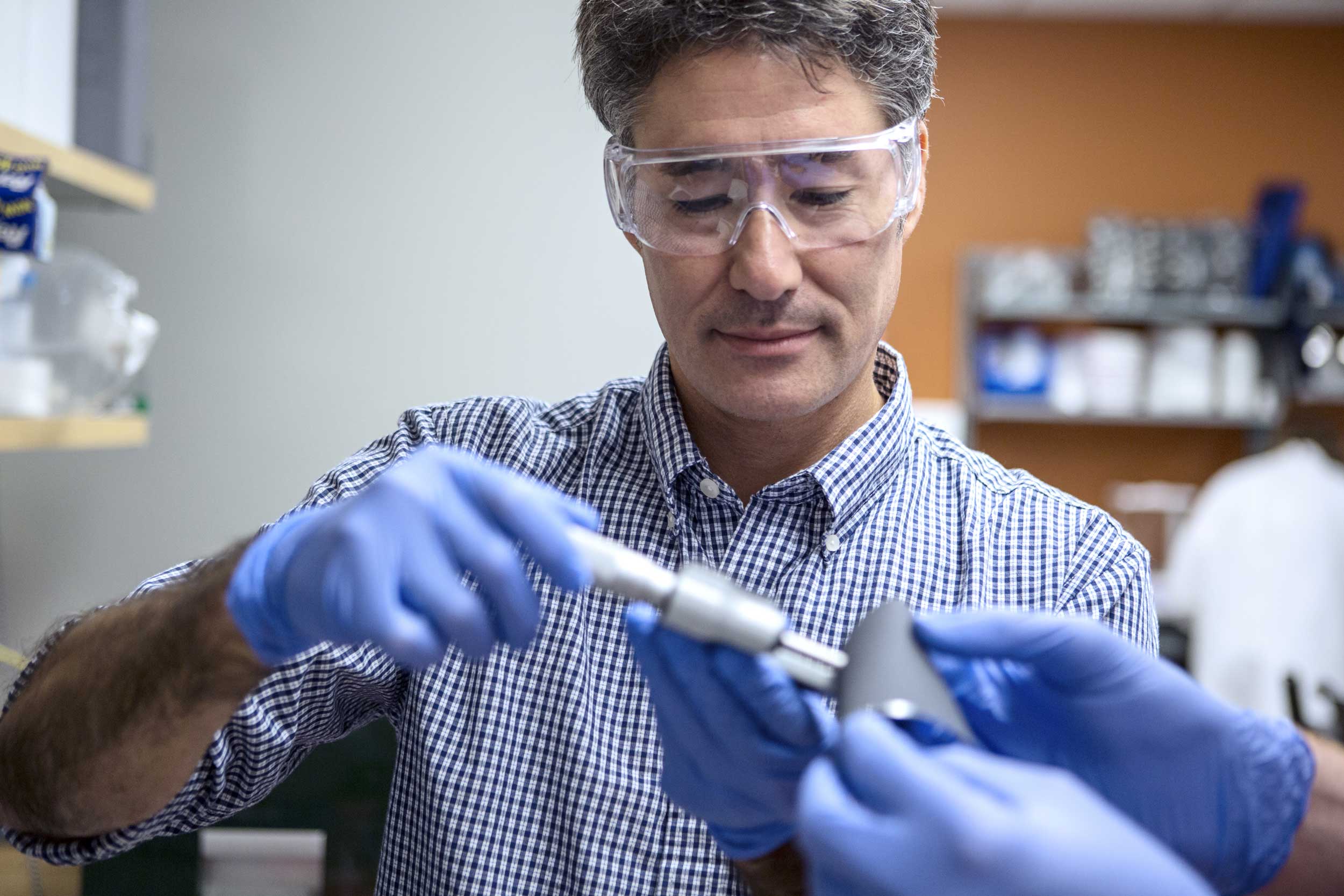 Jeff Sakamoto, associate professor of mechanical engineering and material science and engineering, works on his solid state battery technology. Sakamoto went through an I-Corps program. Image credit: Christina Oh