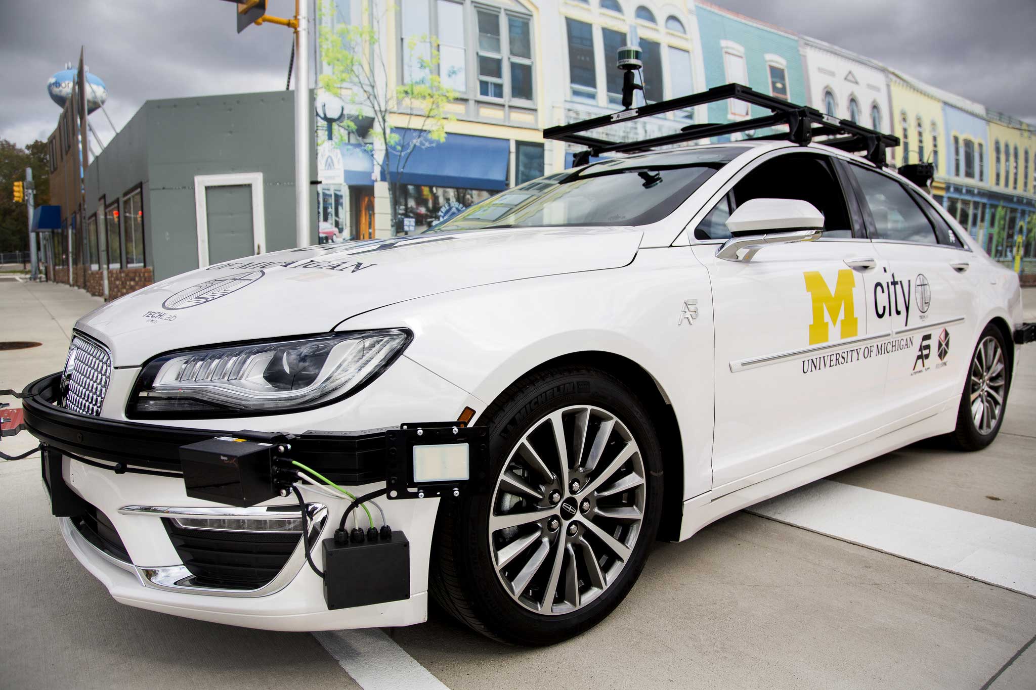 This Lincoln MKZ is an open connected and automated vehicle research platform, or open CAV, at the University of Michigan. It is an open testbed for academic and industry researchers to rapidly test self-driving and connected vehicle technologies at Mcity, a world-class proving ground for advanced mobility vehicles operated by U-M's Mobility Transformation Center. The Lincoln will be joined by two Kia Souls equipped as open CAVs in coming months. Image credit: Joseph Xu, Michigan Engineering