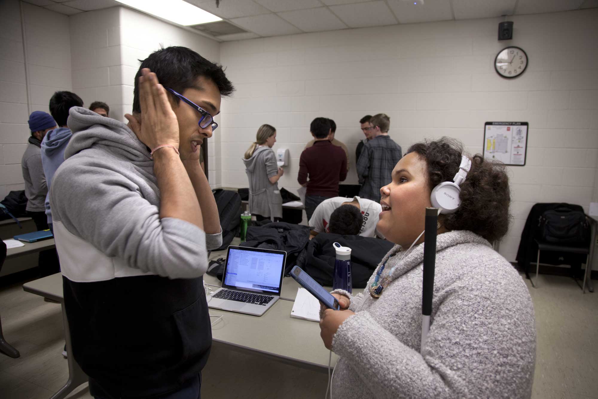 Computer Science and Engineering students partnered with India West (right) to develop technologies that may help other blind and visually impaired people navigate the world around them. Image credit: Marcin Szczepanski, Michigan Engineering