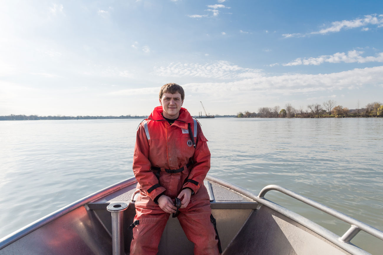 University of Michigan doctoral candidate Joseph Krieger spent three summers on the St. Clair and Detroit rivers doing fieldwork on young lake sturgeon for his dissertation. Krieger and his adviser, U-M fishery biologist James Diana, recently reported that newly hatched sturgeon larvae manage to remain the St. Clair’s swiftly moving North Channel, a surprising finding that has implications for the siting of future spawning reefs. Image credit: Austin Thomason, Michigan Photography