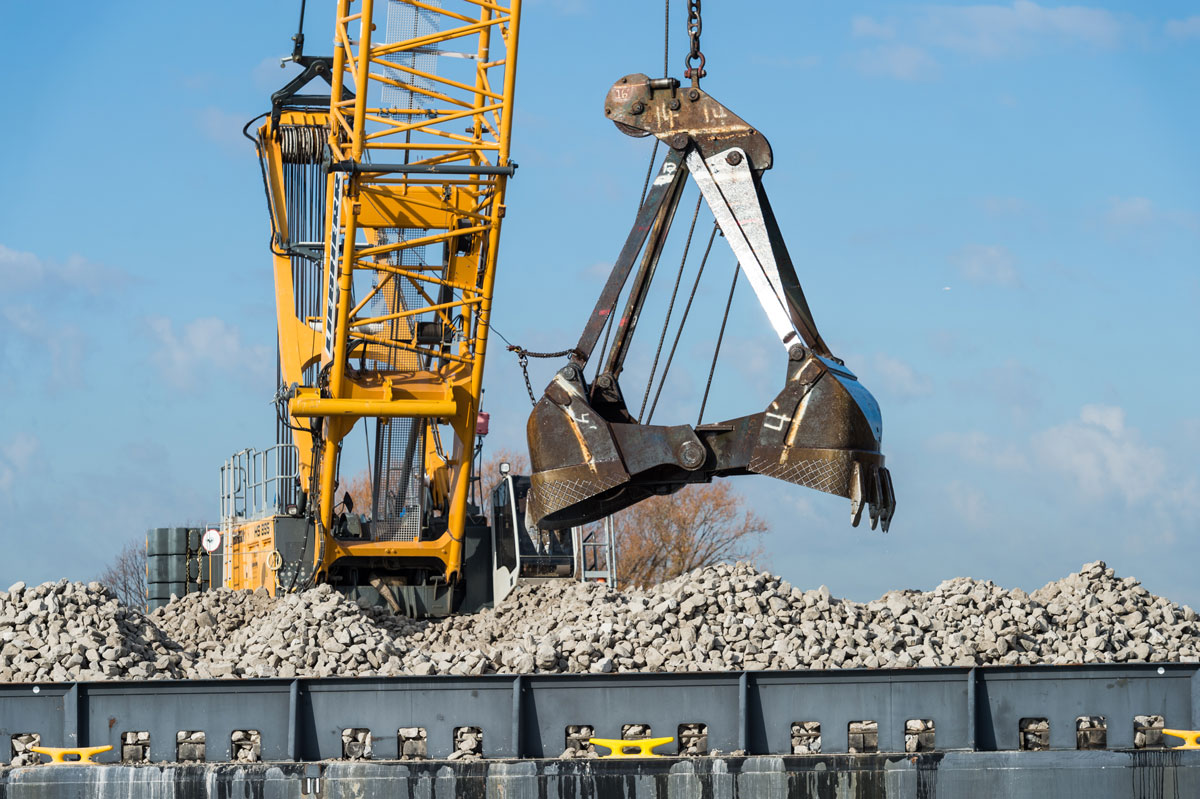 The latest spawning reefs in the Detroit River, near Belle Isle, were built from blocks of broken limestone 4 to 8 inches in diameter. Loads of rock were placed directly on the river bottom using a crane with a clamshell bucket mounted on a barge in the river. Image credit: Austin Thomason, Michigan Photography