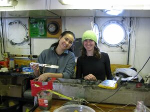 Former University of Michigan graduate student Karla Knudsen, left, and former U-M undergraduate Athena Eyster sample deep-sea sediment collected in 2009 with a coring device beneath the Santa Barbara Channel in California. The sediments were used in a fish-scale analysis. Image credit: Ingrid Hendy