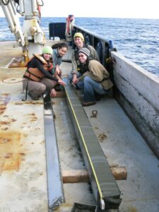 From left to right: Former University of Michigan undergraduate Athena Eyster, former U-M graduate student Karla Knudsen, Ingrid Hendy and former U-M graduate student Meghan Wagner examine a sediment core collected in the Santa Barbara Channel, California, in 2009. Image credit: Arndt Schimmelmann