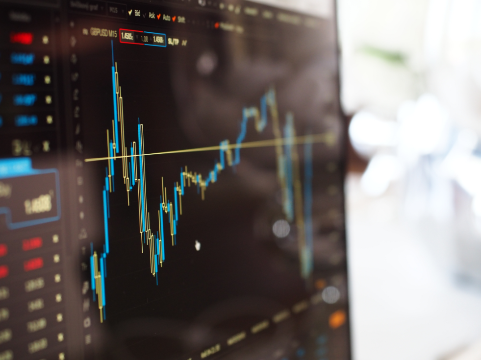 A graph on a stock market monitor. (stock image)