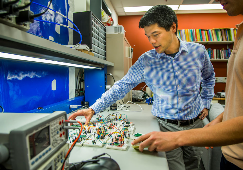 Kevin Fu, associate professor of computer science and engineering, led a team of researchers who used sound to trick hardware sensors called accelerometers in a host of popular consumer electronics. Image credit: Joseph Xu, Michigan Engineering