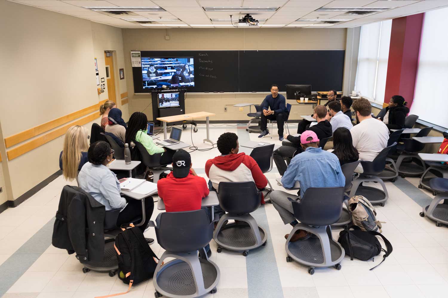 Rudolph Ware and students. Image credit: Daryl Marshke, Michigan Photography
