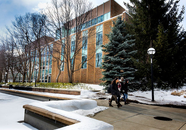 Students walk by the Nuclear Engineering Laboratory on North Campus of the University of Michigan in Ann Arbor, MI on March 14, 2017.   Photo: Joseph Xu/Multimedia Content Producer, University of Michigan - College of Engineering