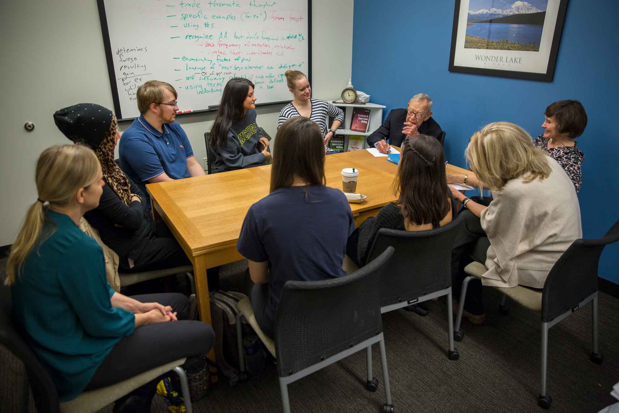 Writing fellows from the Sweetland Center for Writing discuss the M-Write tool with John W. Sweetland. The corporate leader and former business owner shared with students the importance of writing across professions, which is the basis of the center’s work and is what spurred the M-Write program.