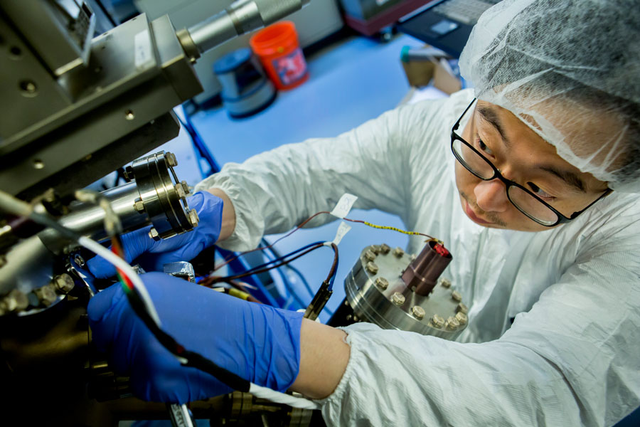 Sunyeol Jun, MSE PhD Student, calibrates the molecular beam epitaxy apparatus in the Gerstacker Building on August 3, 2015. Photo Credit: Joseph Xu