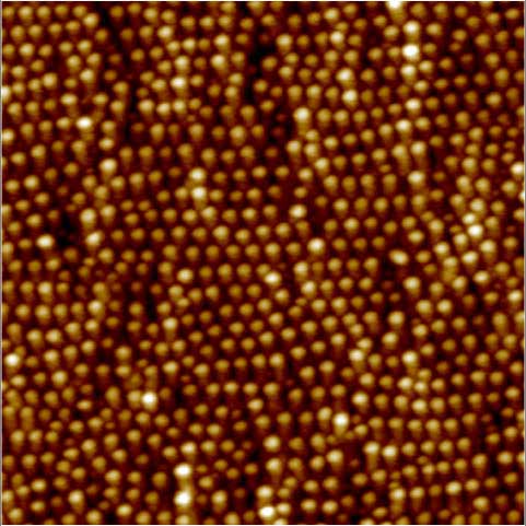 A microscopy photo showing an array of precisely placed metallic nanoparticles on the surface of a gallium arsenide semiconductor. Image courtesy: Rachel S. Goldman, Michigan Engineering