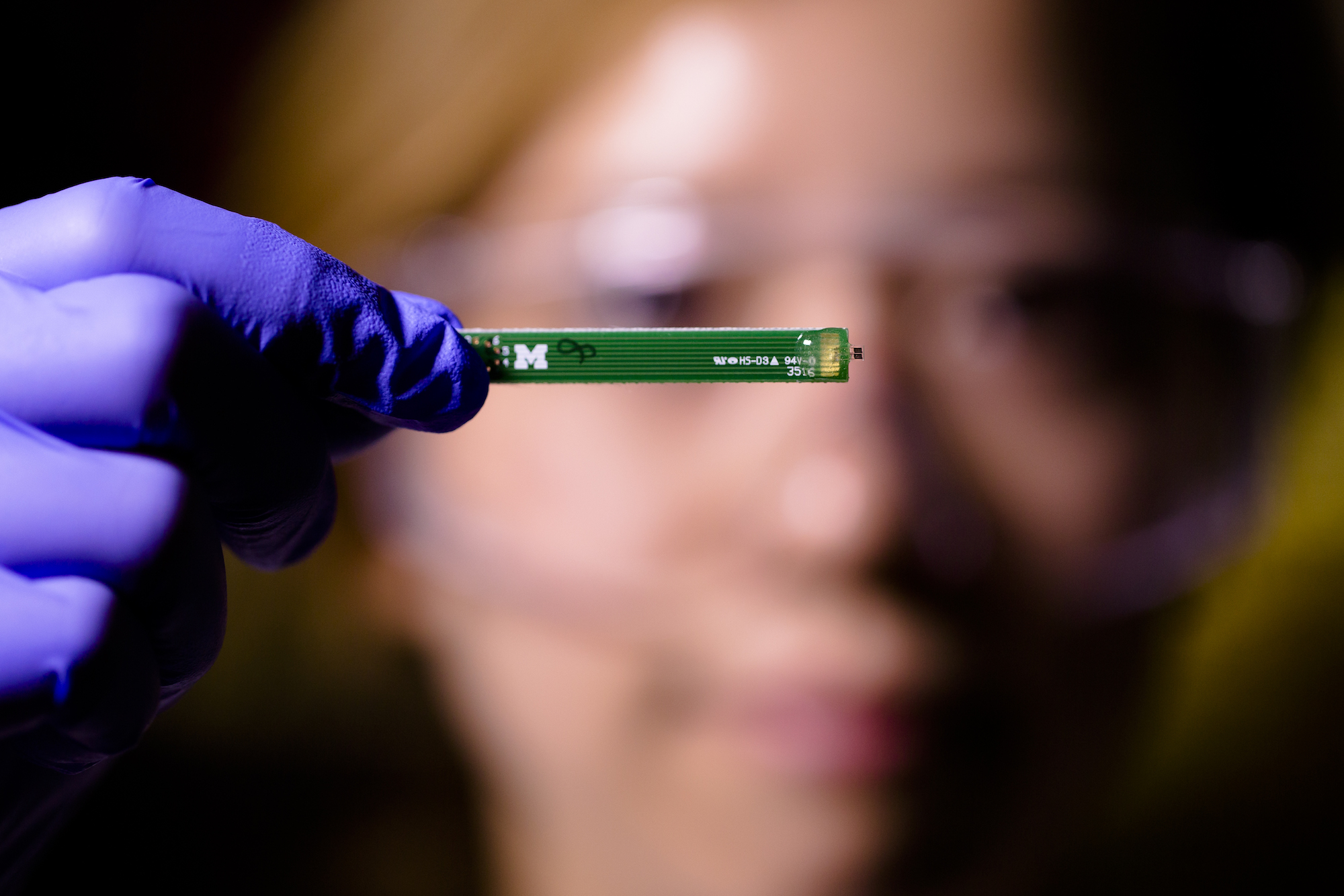 Wen-Chi Lin shows off her electronic lead sensor design. It could enable cities and homeowners to pinpoint pipes that taint water with lead. Image credit: Evan Dougherty, Michigan Engineering Communications & Marketing