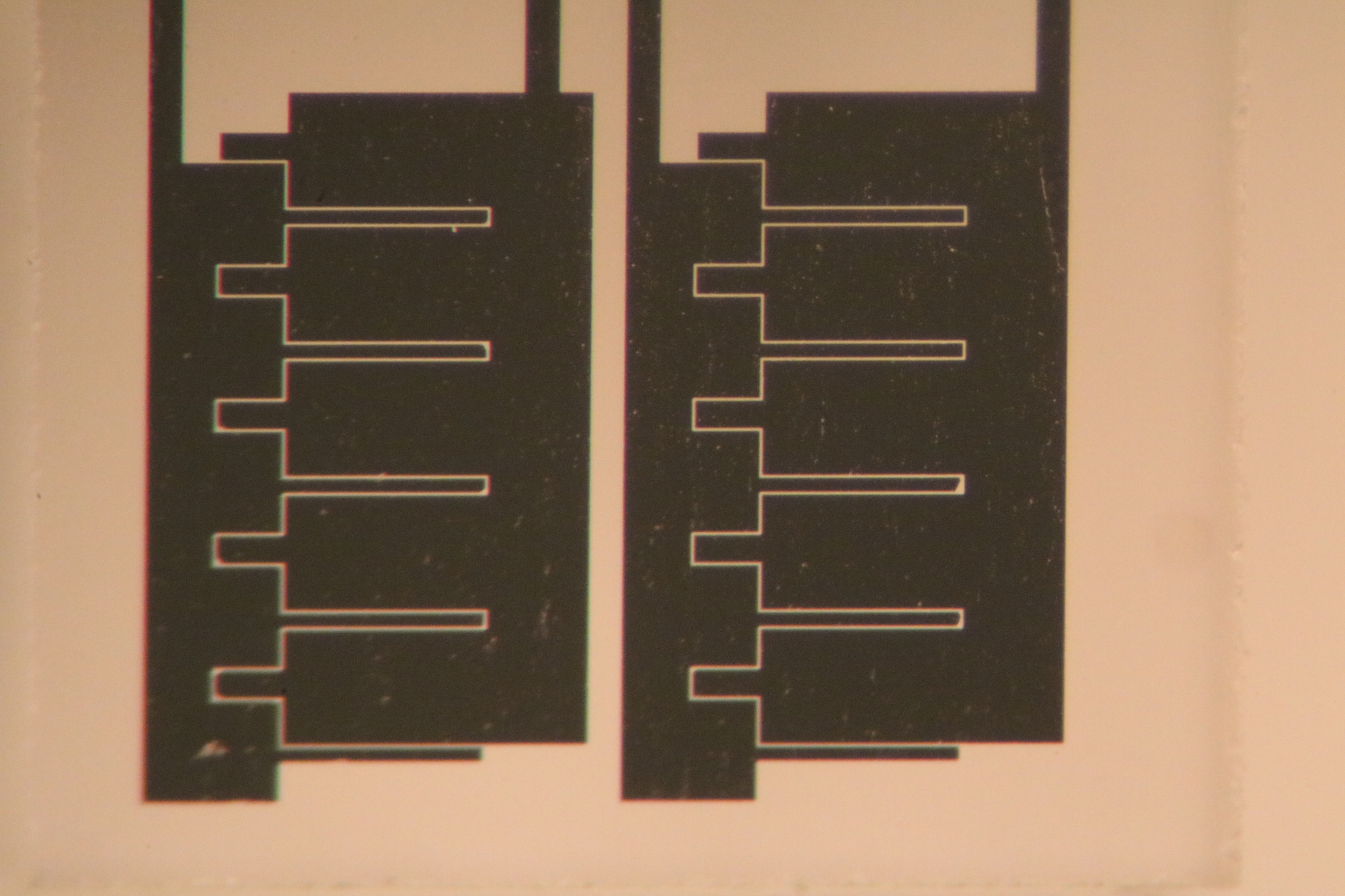 A close-up view of the lead sensor, featuring two pairs of electrodes. It could enable cities and homeowners to pinpoint pipes that taint water with lead. Image credit: Wen-Chi Lin, Burns Lab