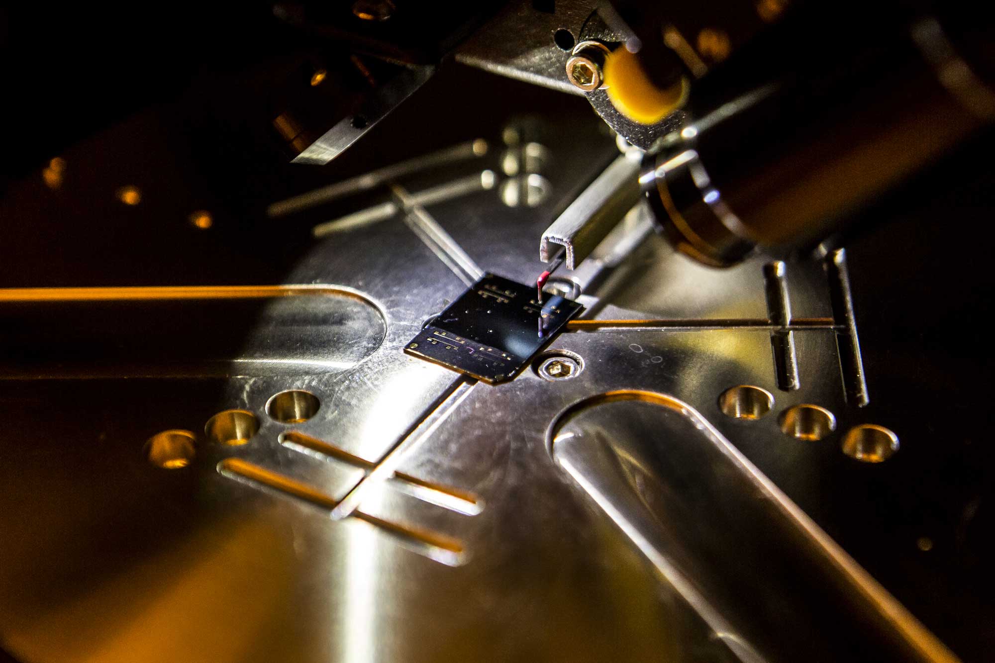 A sample of heat - conducting polymer is tested for thickness in U - M’s Lurie Nanofabrication Facility. Image credit: Joseph Xu, Michigan Engineering