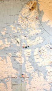 Pins on this map in Taichman’s dental school office show some of the 16 Arctic locations he has visited. Although King William Island (the two pins nearest the bottom of the photo) is inside the Arctic Circle, some of Taichman’s other trips have taken him much farther north in the remote polar region.
