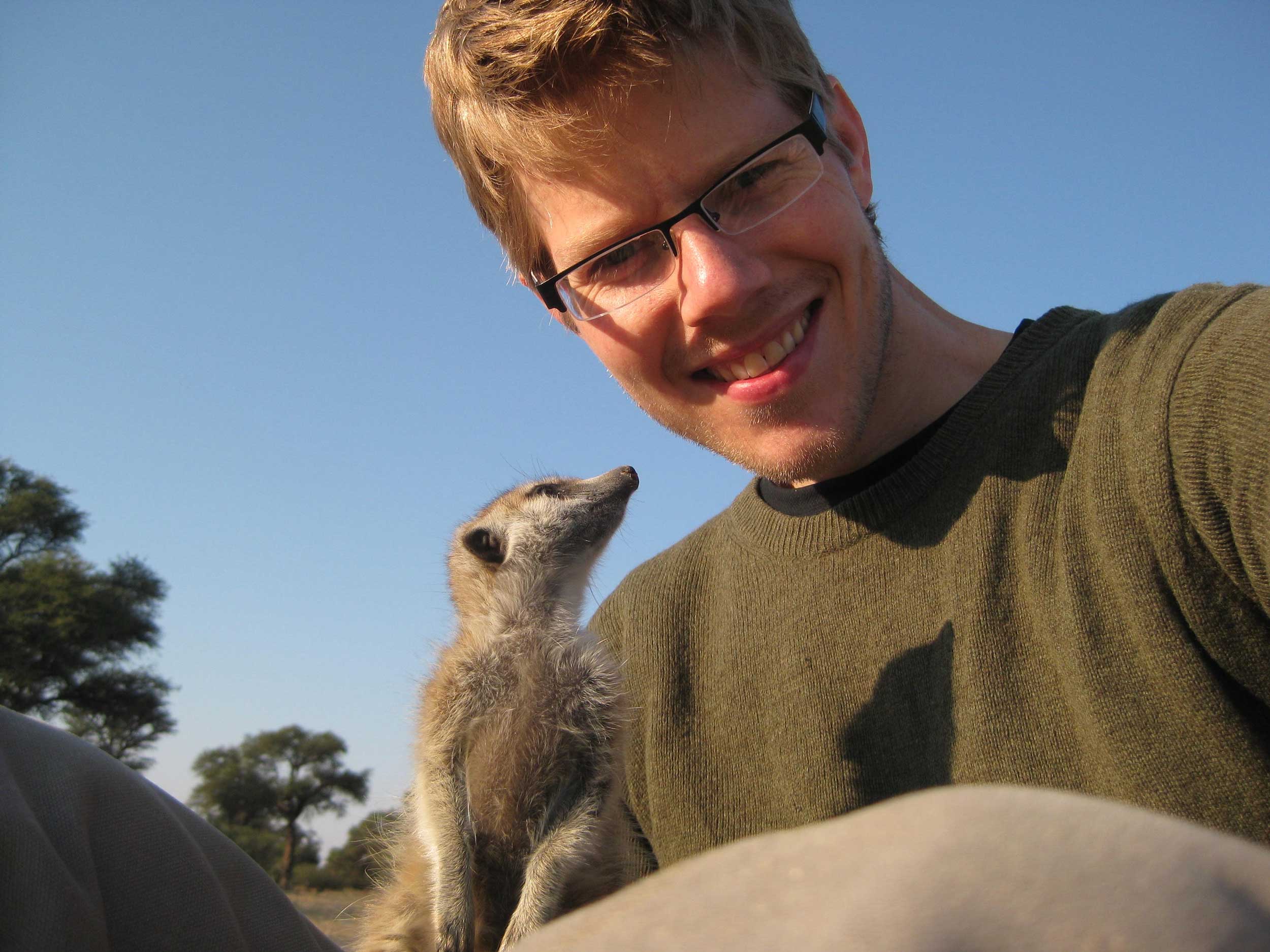Ben Dantzer and meerkat. Image courtesy: Ben Dantzer