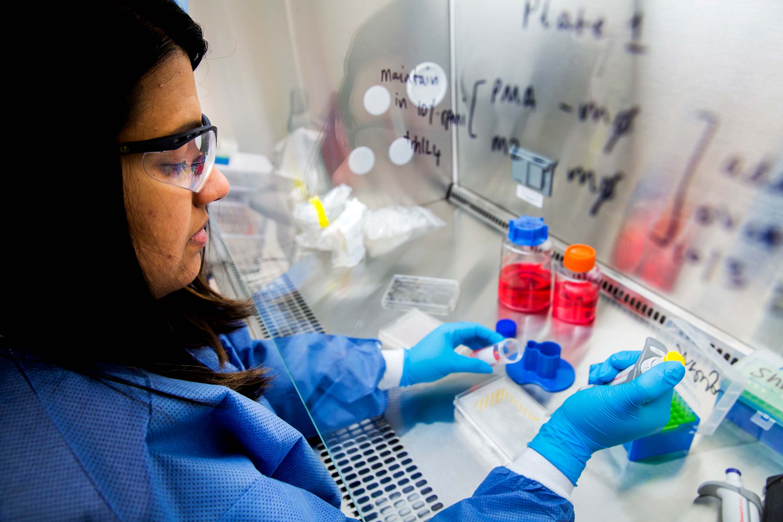 Pooja Mehta, Research Laboratory Tech Associate, constructs a hanging drop spheroid platform. Image credit: Joseph Xu, Michigan Engineering
