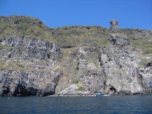 Wolf Island, a small island in the remote northern part of the Galapagos archipelago. University of Michigan paleoclimatologist Julia Cole (who was at the University of Arizona at the time) and her colleagues collected coral samples near the island in 2010. Some of the samples were analyzed to produce a continuous record of the region’s ocean temperature from 1940 to 2010. Image credit: Julia Cole