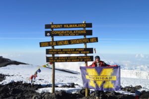 Meagan Malm at the top of Mt Kilimanjaro in Tanzania. Image courtesy: Megan Malm