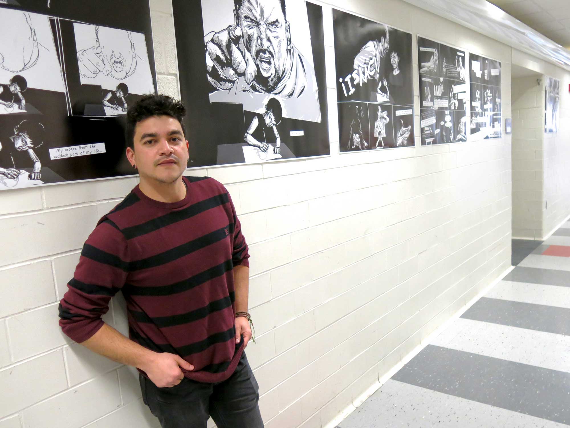 Germán Andino at U-M’s Mason Hall, where a 100 meter-long exhibition of his work ‘The Habit of Silence’ is on view until April 6th. Image courtesy the artist.