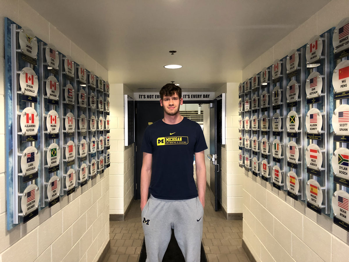 Swimmer Luiz Gustavo Borges at the Canham Natatorium hallway.