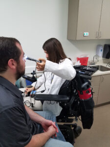 Image of doctor checking eye. Image credit: David Lorch