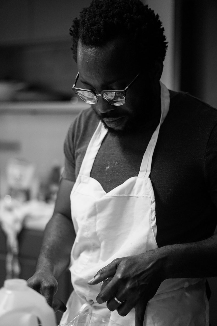 Photos of Tunde Wey during his pop-up dinner series “Blackness in America.” Image Credit: Moyo Oyelola, Courtesy of Tunde Wey.