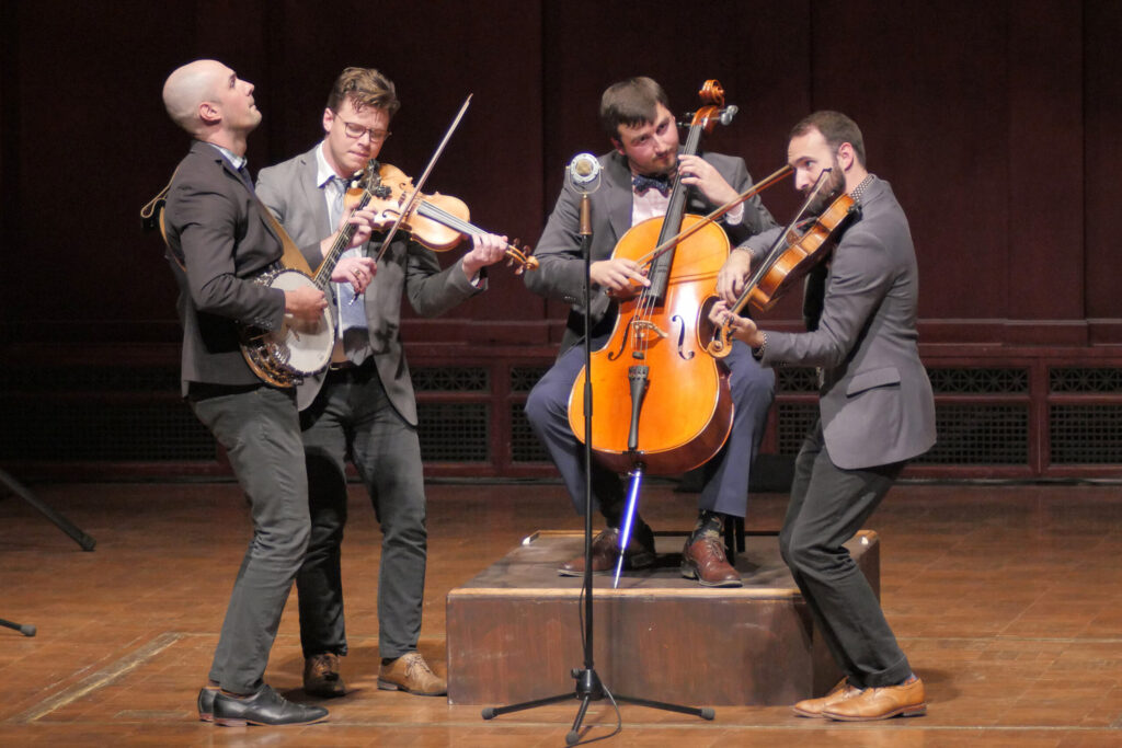 Awarded first prize in the open division, invoke features Nick Montopoli (violin/banjo), Karl Mitze (viola/mandolin), Cachariah Metteson (violin) and Geoff Manyin (cello). Image credit: Peter Smith