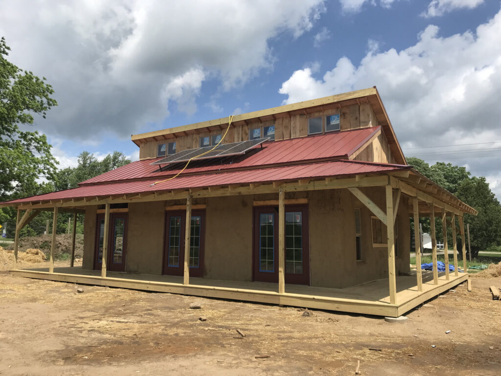 Despite some rain delays, University of Michigan students, led by Joe Trumpey, an associate professor at the Penny W. Stamps School of Art & Design and professor at the U-M School for Environment and Sustainability, recently completed the straw bale building at the U-M Campus Farm at the Matthaei Botanical Garden.