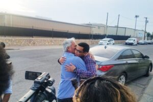 Emilio Gutierrez-Soto and son Oscar embracing after being reunited