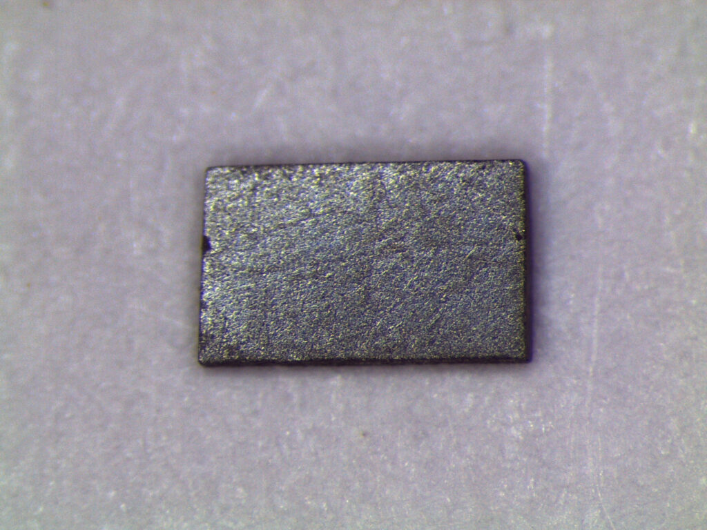 Pictured is a crystal of ytterbium dodecaboride, or YbB12. Image credit: Lu Li