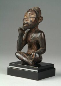 Artist unrecorded, Kongo peoples, Vili group, Democratic Republic of the Congo, Angola, Republic of the Congo, Nkisi (power figure), ca. 1800, wood, tukula powder and kaolin. Image courtesy: U-M Museum of Art, Gift of Candis and Helmut Stern